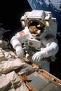 Astronaut conducting experiments in zero gravity, emphasizing the importance of research and discovery in space