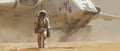 Astronaut exploring desert planet with large spaceship and dust in background Royalty Free Stock Photo