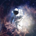 Astronaut exploring outer space conducting spacewalk