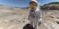 Astronaut exploring rocky terrain on a distant planet in a simulation environment designed to mimic the lunar surface