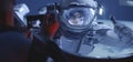 Astronaut filming spacewalking crewmate Royalty Free Stock Photo