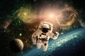 Astronaut flies over the earth in space. Royalty Free Stock Photo