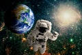 Astronaut flies over the earth in space. Royalty Free Stock Photo