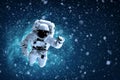 Astronaut flies over the earth in space. Royalty Free Stock Photo