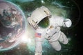 astronaut float in the space in weightlessness near to planet earth Elements of this image furnished by NASA