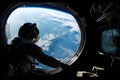 astronaut, floating in the weightless environment of space, with view of the earth visible through window
