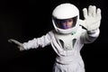 Astronaut from the future says stop. Portrait of a young woman in a helmet.