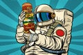 Astronaut with a giant burger