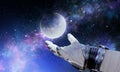 Moon planet in spaceman hand. Mixed media Royalty Free Stock Photo