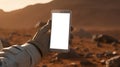 Astronaut holding mobile phone mockup Royalty Free Stock Photo