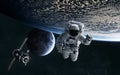 Astronaut, ISS in low Earth orbit. Moon. Solar system