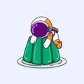 The astronaut is jumping and hugging the big jelly and very hungry to eat that jelly