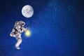 Astronaut lighting universe. moon lighting.mission in outer space Royalty Free Stock Photo