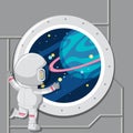 An astronaut looking out of space window Royalty Free Stock Photo
