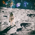 Astronaut looks up at an alien sun that illuminates the barren world he stands on. Elements of this image furnished by NASA