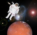 Astronaut and Mars. Deeps space. The elements of this image furnished by NASA Royalty Free Stock Photo