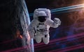 Astronaut in orbit of deep space planet