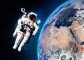 Astronaut in outer space against the backdrop of