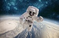 Astronaut in outer space against the backdrop of the planet earth. Typhoon over planet Earth Royalty Free Stock Photo