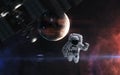 Astronaut in outer space against background of inhabited planet in light of red star. Space station blurred in motion Royalty Free Stock Photo