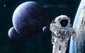 Astronaut in outer space in orbit of distant planet. Planets and satellites of deep space. Science fiction