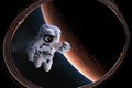 Astronaut in outer space from porthole on background of the Mars. Elements of this image furnished by NASA