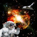 Astronaut in outer space. Shuttle on the backdrop. The elements of this image furnished by NASA Royalty Free Stock Photo