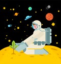 Astronaut is planting tree on moon. spaceman planting plant Royalty Free Stock Photo
