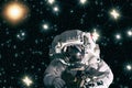 An astronaut poses against spectacular space view.The elements of this image furnished by NASA