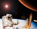 Astronaut shows the thumbs-up about flying to Mars. Rocket flying to Mars. The elements of this image furnished by NASA