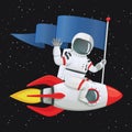 Astronaut sitting astride the rocketnship holding the flag and waving.
