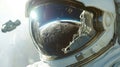 Astronaut in Space with Moon Reflection in Visor Royalty Free Stock Photo