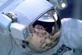 The astronaut in a space suit, in reflection of a helmet it is visible the earth. Elements of this image were furnished by NASA Royalty Free Stock Photo