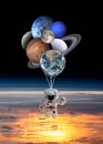 Astronaut spaceman with planets shaped balloons in solar system. Elements of this image furnished by NASA