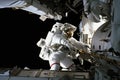 Astronaut engaged in maintenance at space station. Generative AI