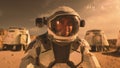Astronaut in spacesuit smiles, looks at camera