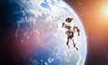 Astronaut spacewalk in space near Earth. Royalty Free Stock Photo