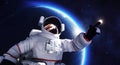 Astronaut spacewalk in space near a planet and pointing his finger. Royalty Free Stock Photo