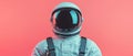 An astronaut stands against a vibrant pink background symbolizing space exploration Royalty Free Stock Photo