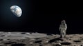 Astronaut stands on the Moon surface looking to the Earth on the background, Exploring space and other planets Royalty Free Stock Photo