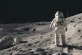 Astronaut walking on lunar surface. Space exploration and adventure concept for design and education Royalty Free Stock Photo