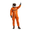 Astronaut wearing an orange spacesuit and left hand pointing finger up