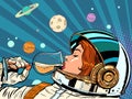Astronaut woman drinks a glass of wine. Alcoholic party, new year holiday