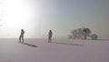 Astronauts on snowy alien winter landscape. Realistic 3D render