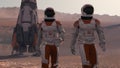 Astronauts wearing space suit walking on the surface of mars. Exploring mission to mars. Futuristic colonization and