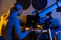 Astronomer man do science work using the telescope