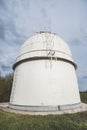 Astronomical observatory radio telescope design in the fields in early spring in cloudy weather