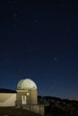 Astronomical observatory under the night sky and stars on the Matajur mountain Royalty Free Stock Photo