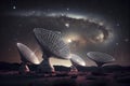 Astronomy deep space radio telescope arrays at night pointing into space Royalty Free Stock Photo