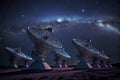 Astronomy deep space radio telescope arrays at night pointing into space Royalty Free Stock Photo